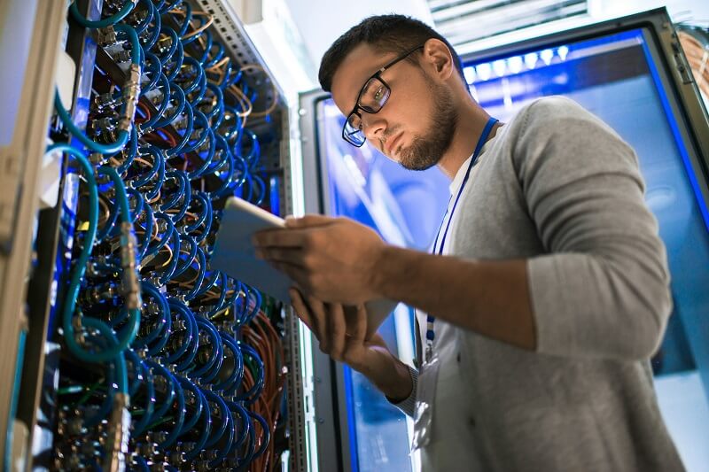 Network Engineer Fixing IT Issues and Network Problems